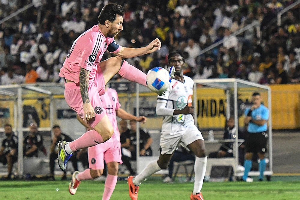 | Photo: AP/Collin Reid : CONCACAF Champions Cup: Inter Miami forward Lionel Messi controls the ball