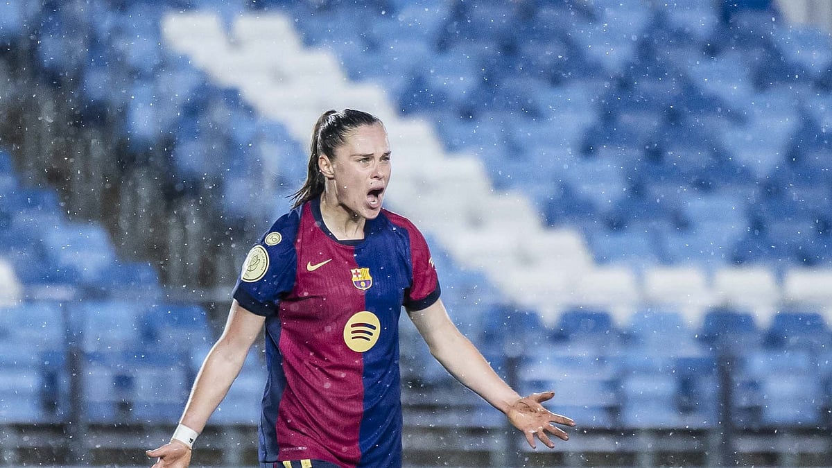 Photo: X | Barca World : Barcelona Women player celebrating a goal.