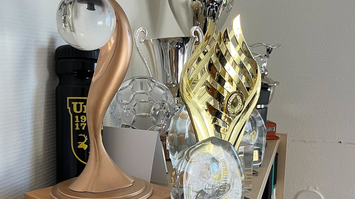 (AP Photo/Steve Douglas) : The 2003 and 2004 UEFA Women's Cup trophies rest on a shelf inside the offices of Umeå IK soccer team, next to Umeå Energi Arena in Umeå, Sweden, Monday, March 10, 2025. 
