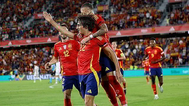 AP : Bryan Gil celebrates his side's second goal during a Nations League match between Spain and Switzerland.