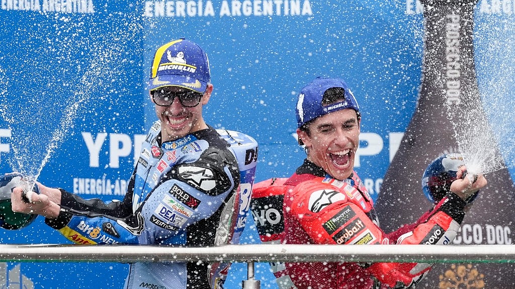 AP : Marquez brothers Marc (right) and Alex celebrate after finishing on the Argentine MotoGP podium at the Termas de Rio Hondo circuit.