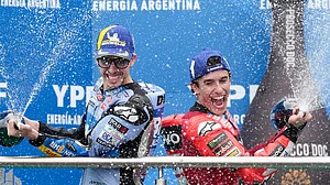 AP : Marquez brothers Marc (right) and Alex celebrate after finishing on the Argentine MotoGP podium at the Termas de Rio Hondo circuit.
