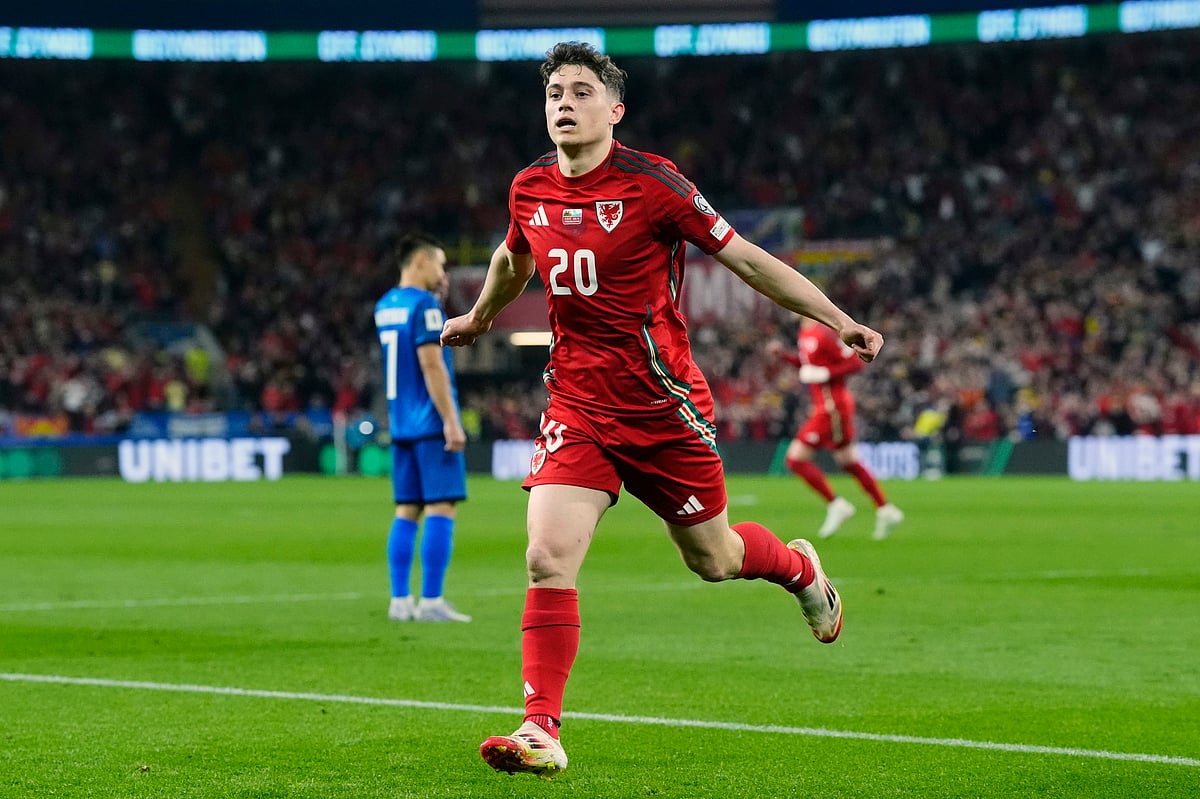  (Nick Potts/PA via AP) : Wales' Daniel James celebrates scoring his sides first goal of the game during the 2026 FIFA World Cup qualifying match against Kazakhstan at the Cardiff City Stadium, Saturday March 22, 2025, in Cardiff, Wales.


