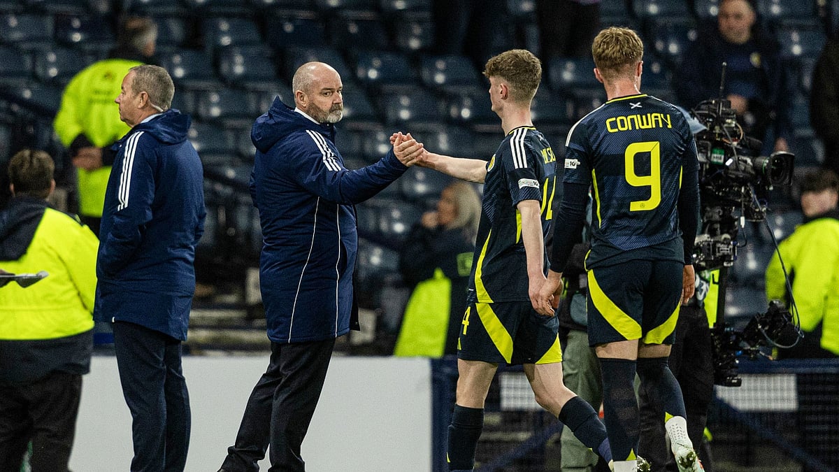 Scotland manager Steve Clarke with James Wilson and Tommy Conway.