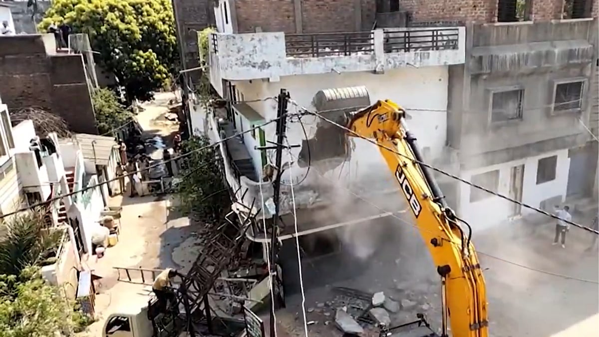 | Photo: Screengrab from PTI :  Illegal Portion Of Key Accuseds House Demolished 