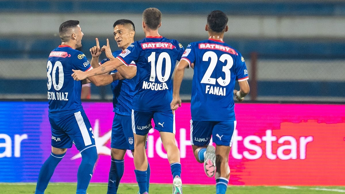 Photo: FSDL/ISL : Sunil Chhetri celebrates with teammates after scoring for Bengaluru FC against Mumbai City FC in the Indian Super League.