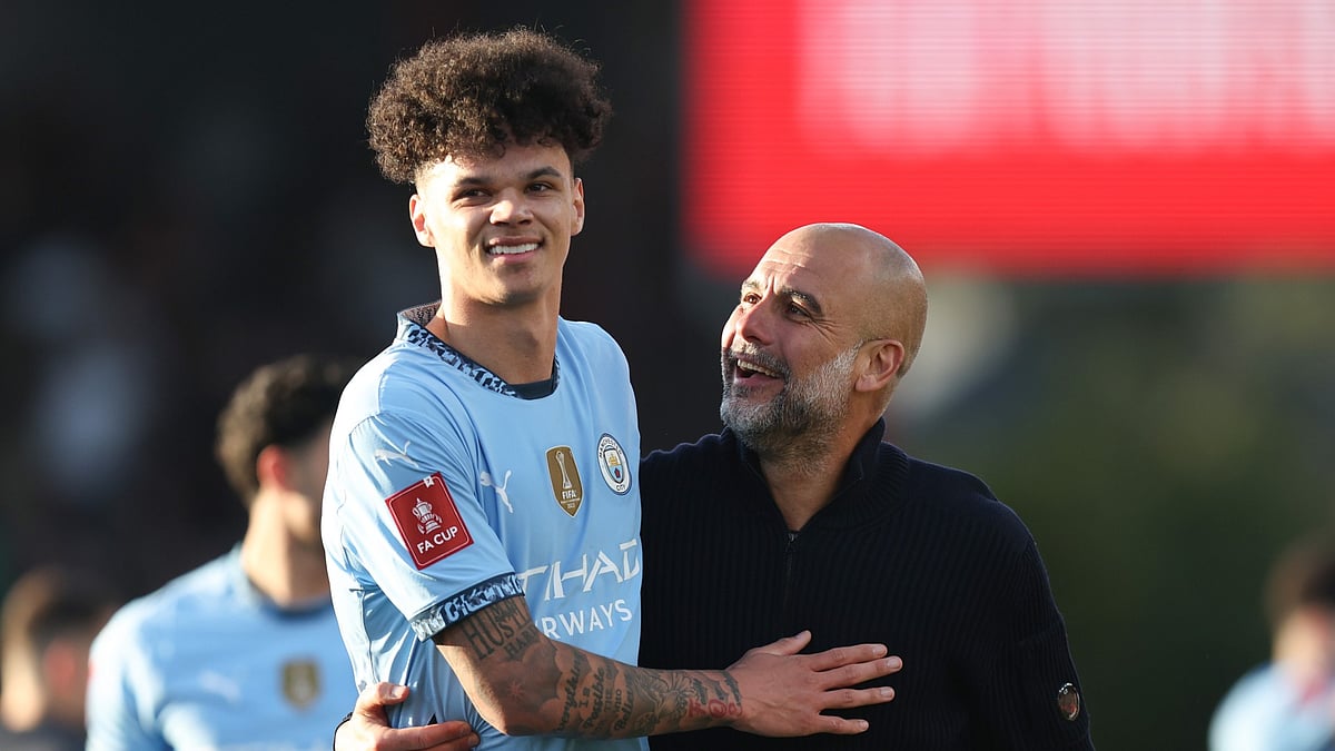 Nico O'Reilly and Pep Guardiola