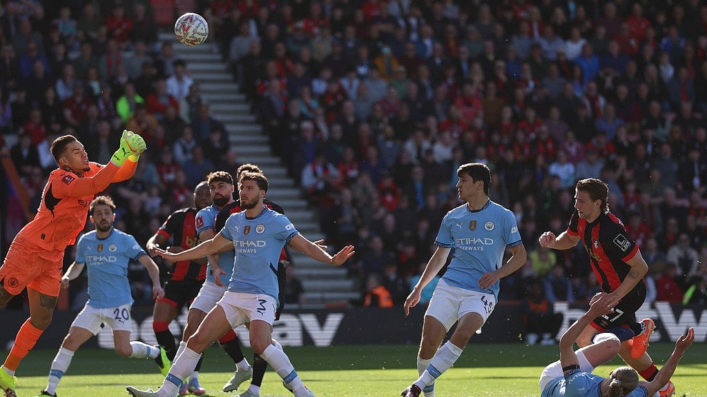 AP : Ederson, left, makes a save during the English FA Cup quarterfinal soccer match between Bournemouth and Manchester City at the Vitality stadium in Bournemouth.