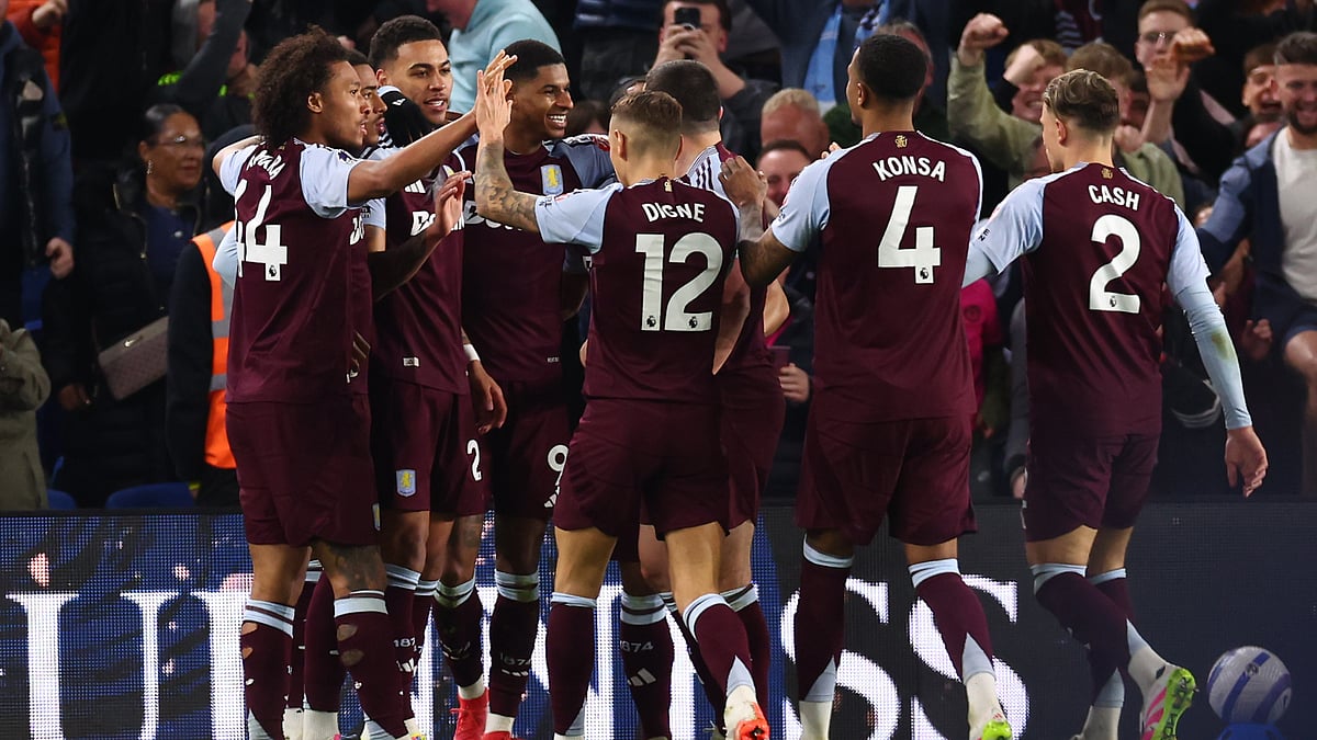 Aston Villa celebrate Marcus Rashford's goal.