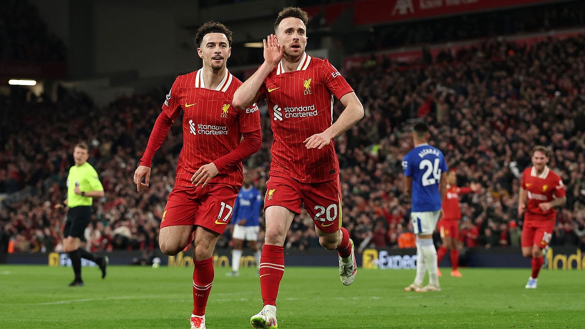 Jota celebrates his winner against Everton.