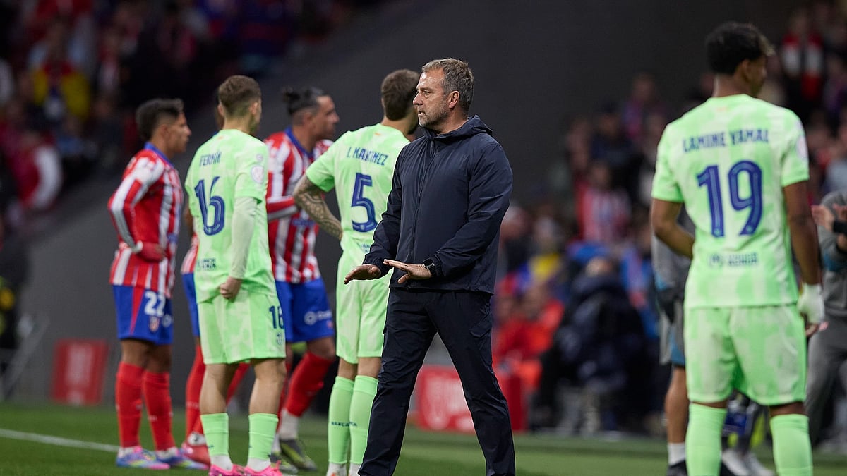 Hansi Flick is playing it cool when it comes to Barca's treble chances