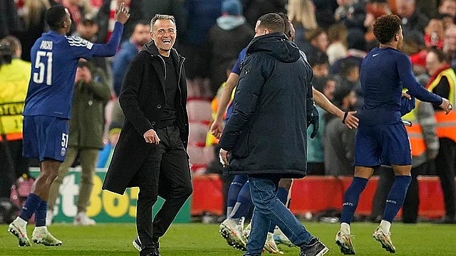 AP : File photo of Paris Saint-Germain head coach Luis Enrique celebrating a Champions League win.