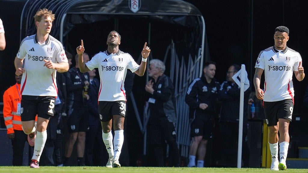 Photo: AP : Fulham's Ryan Sessegnon, centre, celebrates after scoring his side's opening goal against Liverpool in the English Premier League.