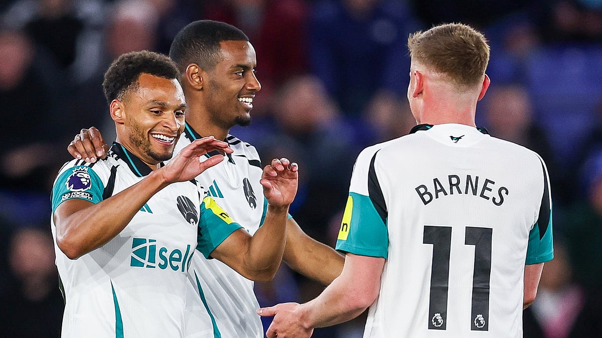 Goalscorer Jacob Murphy celebrates with Harvey Barnes