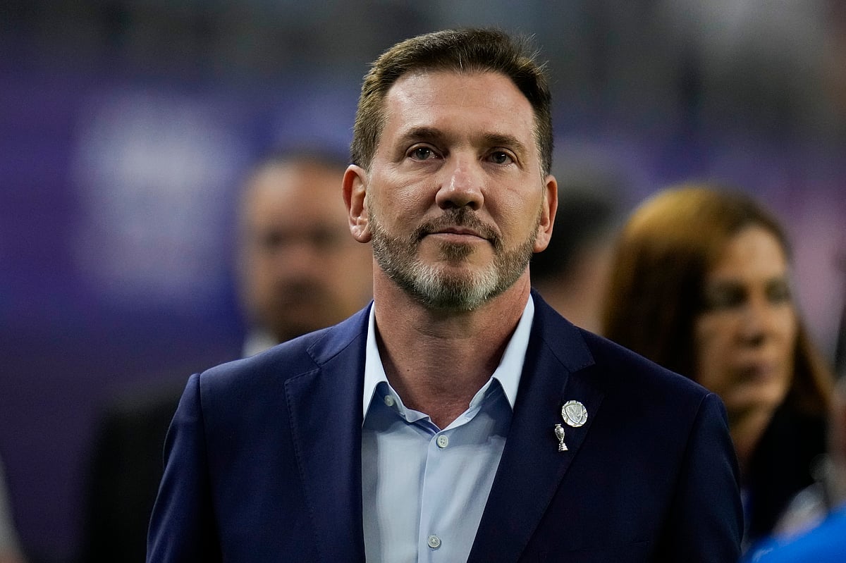 (AP Photo/Julio Cortez, File) : FILE - Alejandro Dominguez, president of CONMEBOL, enters the stadium during a Copa America quarterfinal soccer match between Venezuela and Canada, July 5, 2024, in Arlington, Texas.

