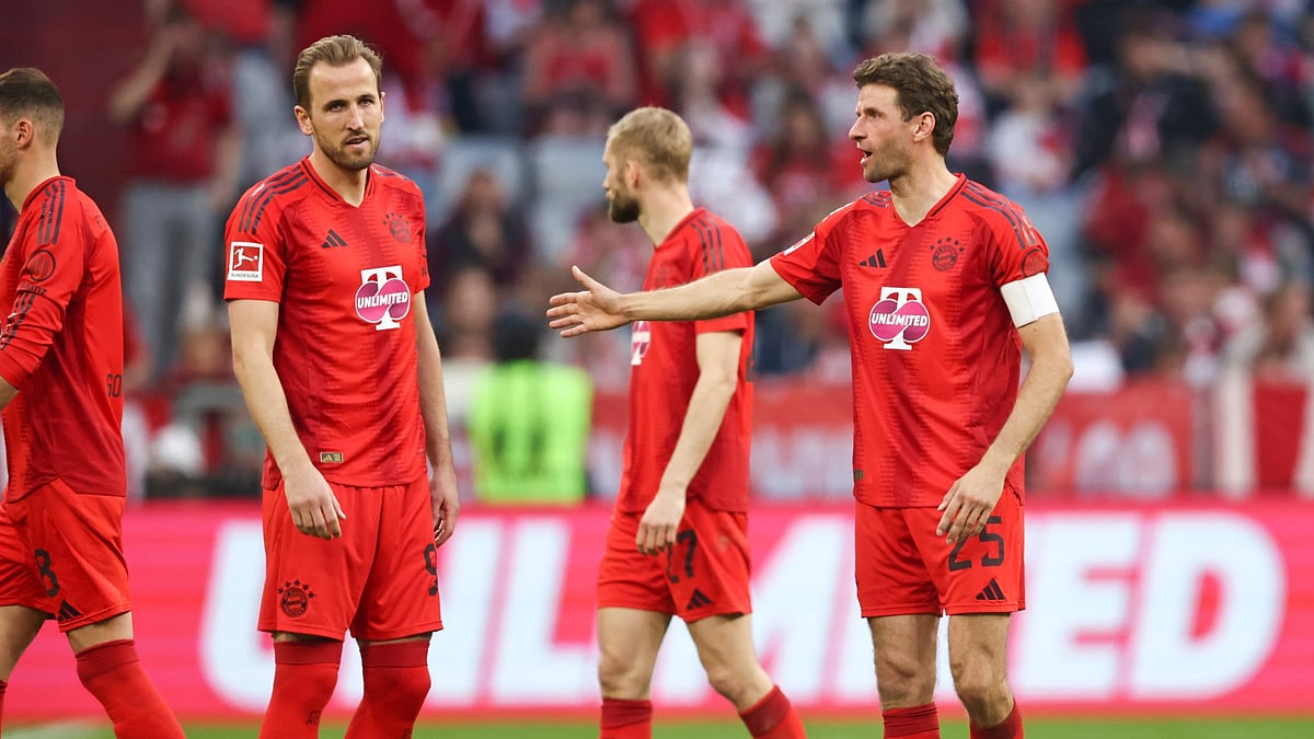 Thomas Muller and Harry Kane during Der Klassiker