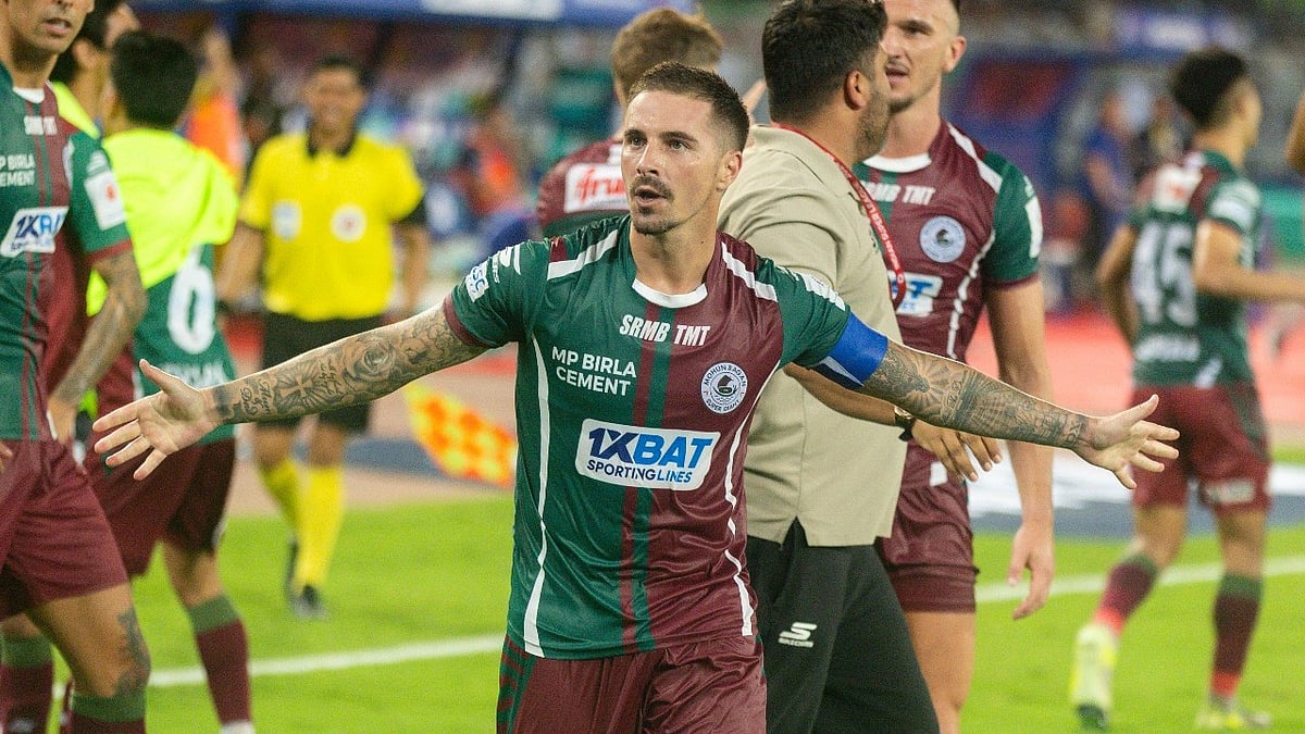 | Photo: FSDL/ISL : Mohun Bagan's Jamie Maclaren celebrates after scoring against Benglauru FC in the ISL 2024-25 Final match.