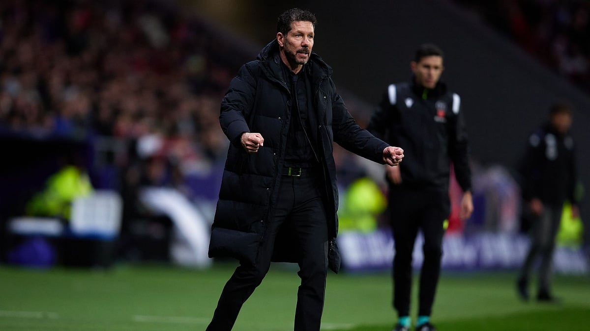 Simeone celebrates during Atletico's win over Valladolid