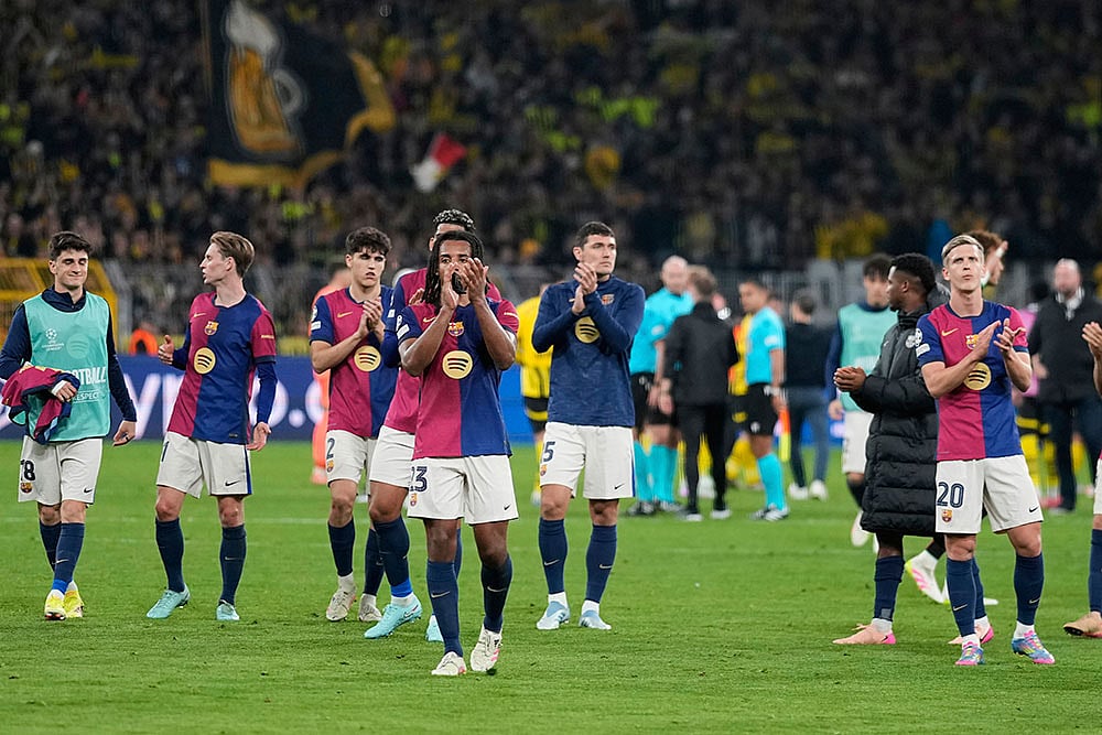 | Photo: AP/Matthias Schrader : Champions League: Borussia Dortmund vs FC Barcelona