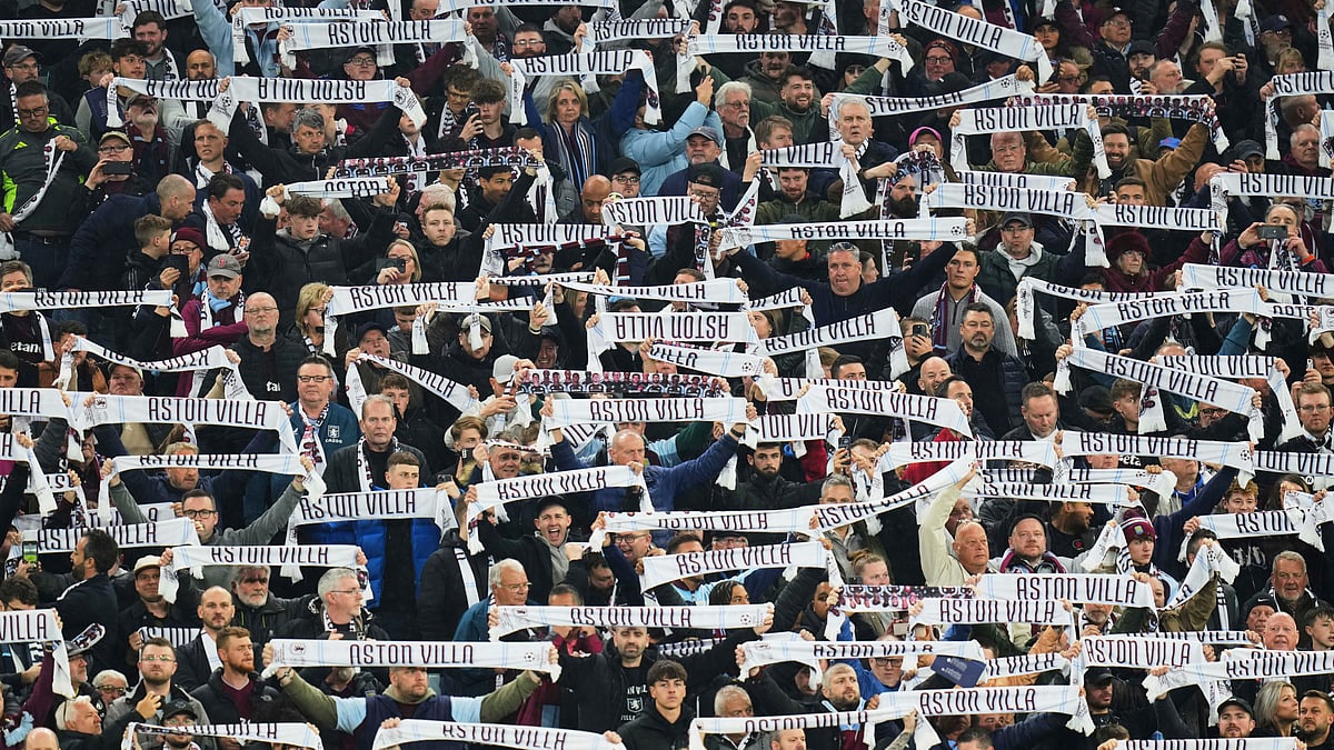 | AP Photo/Kirsty Wigglesworth : Fans cheer ahead of the UEFA Champions League quarterfinal second-leg soccer match between Aston Villa and Paris Saint-Germain at Villa Park Stadium in Birmingham, England, on April 15, 2025.