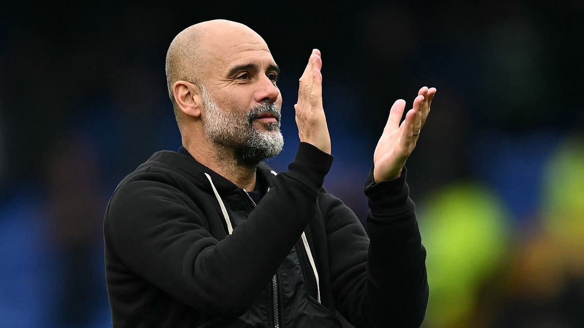 File : Pep Guardiola applauds the fans at Goodison Park for the final time.