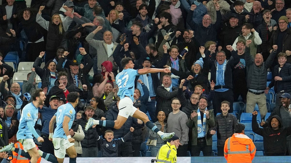 (AP Photo/Jon Super) : Manchester City's Matheus Nunes celebrates after scoring his side's second goal during the English Premier League match between Manchester City and Aston Villa at Etihad Stadium.