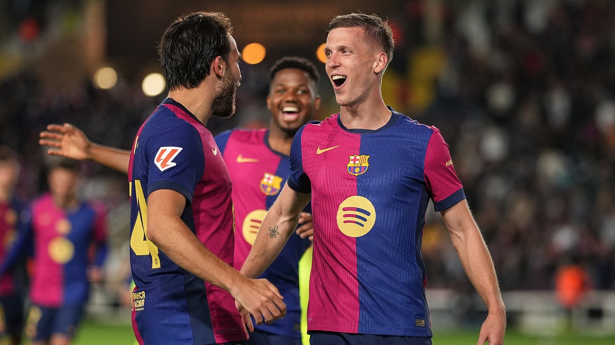 Dani Olmo celebrates after scoring Barcelona's goal