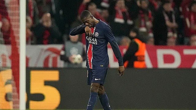 AP : PSG's Ousmane Dembele leaves the pitch after being shown a red card during their UEFA Champions League 2024-25 match against Bayern Munich at the Allianz Arena in Munich, Germany.