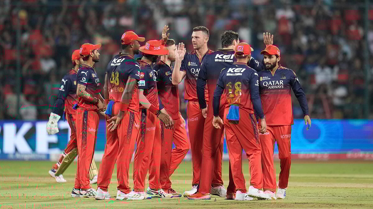 (AP Photo/Aijaz Rahi)

 : Royal Challengers Bengalurus Josh Hazlewood celebrate a wicket during the Indian Premier League cricket match. 
