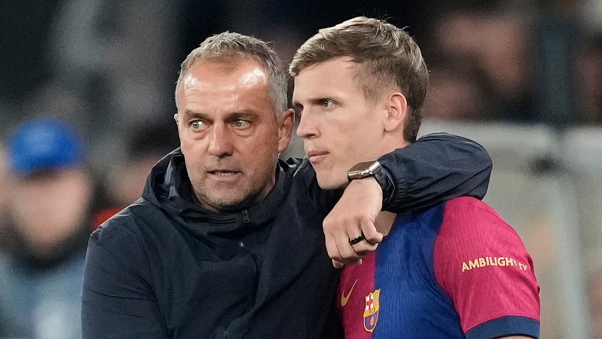 AP/Martin Meissner, File : Barcelona's head coach Hansi Flick, left, gives instructions to Dani Olmo during their UEFA Champions League 2024-25 match against Borussia Dortmund at the Signal Iduna Park in Dortmund, Germany, on April 15, 2025.