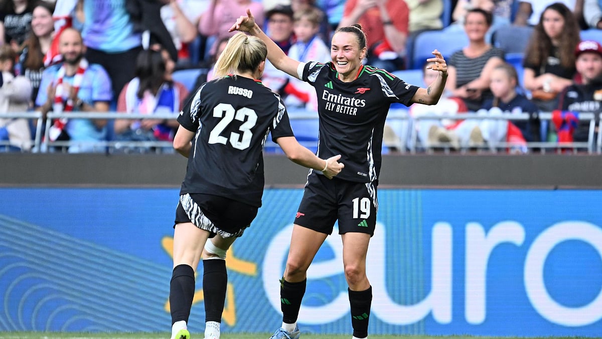 Russo and Foord celebrate during Arsenal's win over Lyon