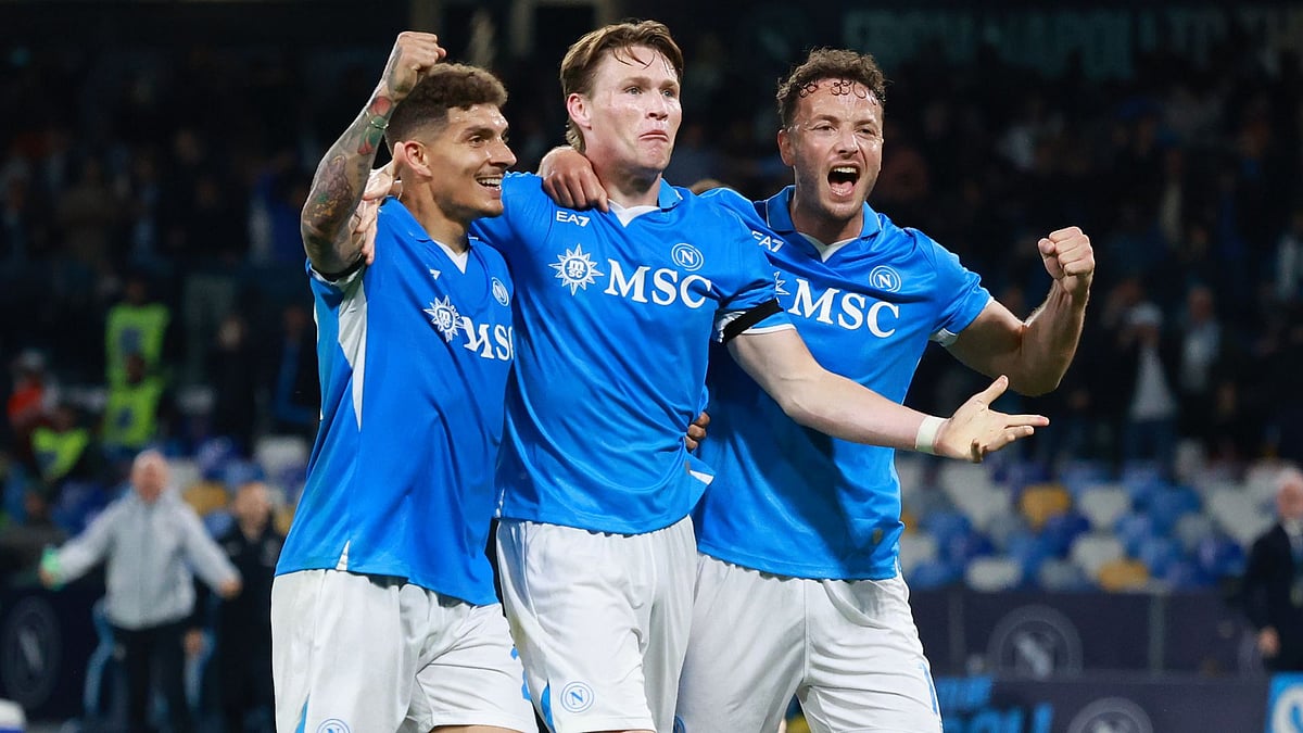 McTominay celebrates with Giovanni Di Lorenzo (left) and Amir Rrahmani (right)