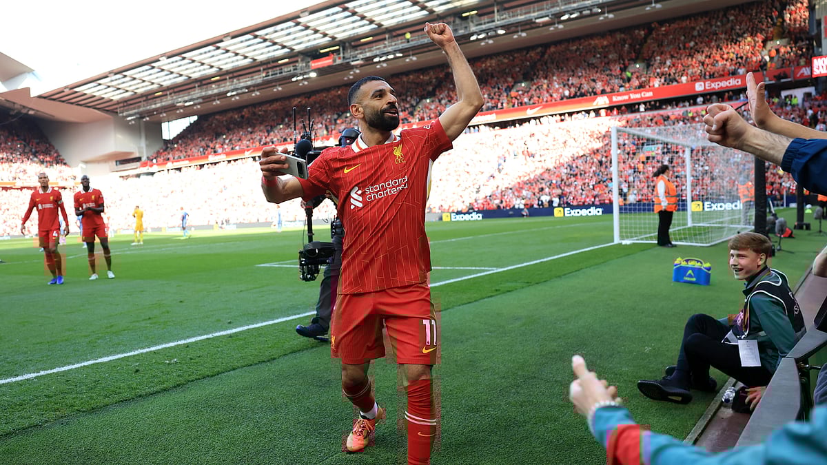 Mohamed Salah takes a selfie after scoring Liverpool's fourth goal