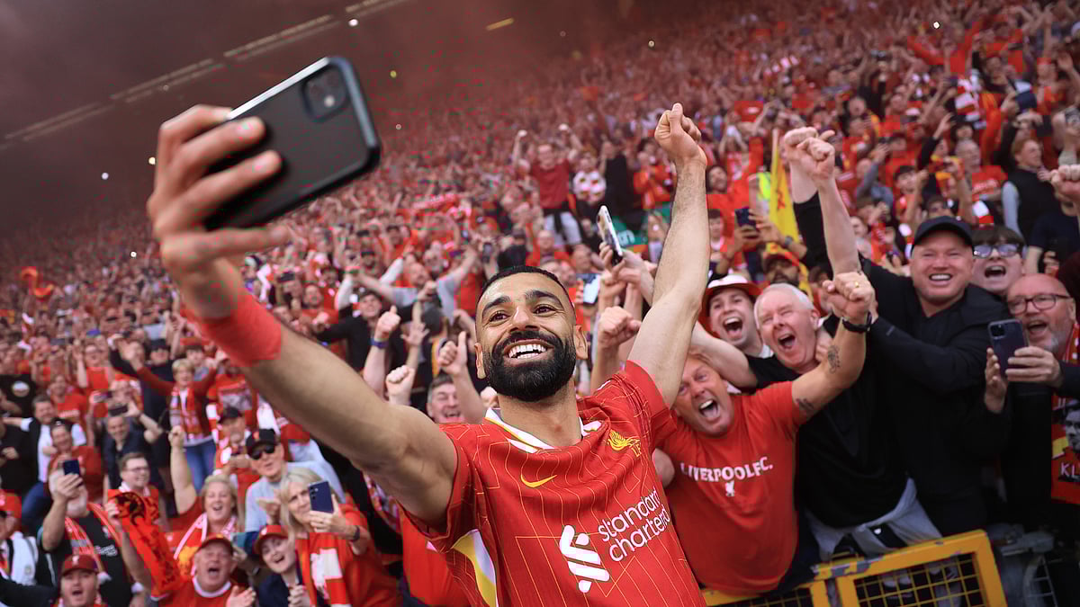 Salah celebrates with Liverpool's fans