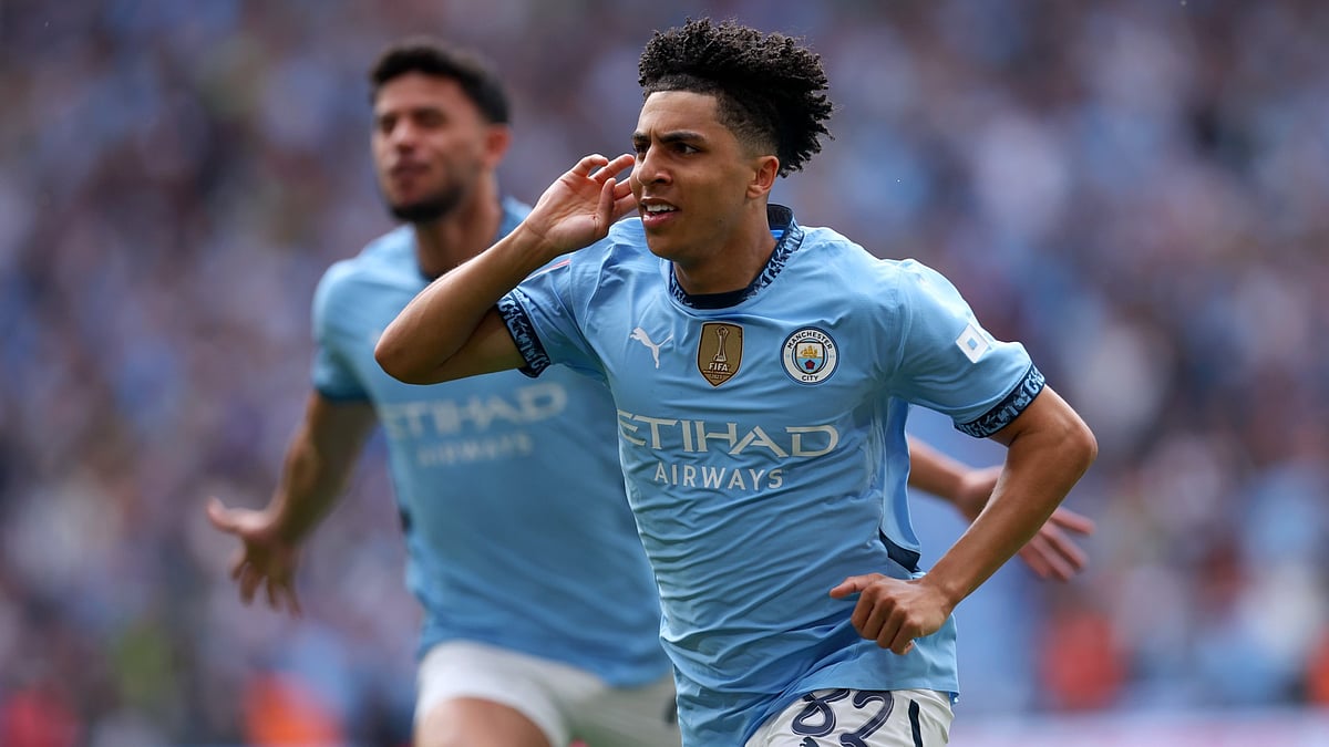 Rico Lewis celebrates after scoring in the FA Cup semi-finals