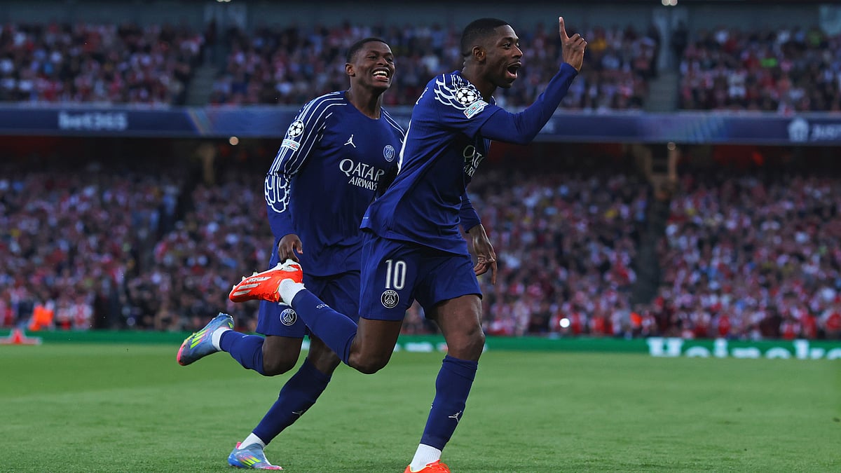 Ousmane Dembele celebrates after finding the net at the Emirates Stadium