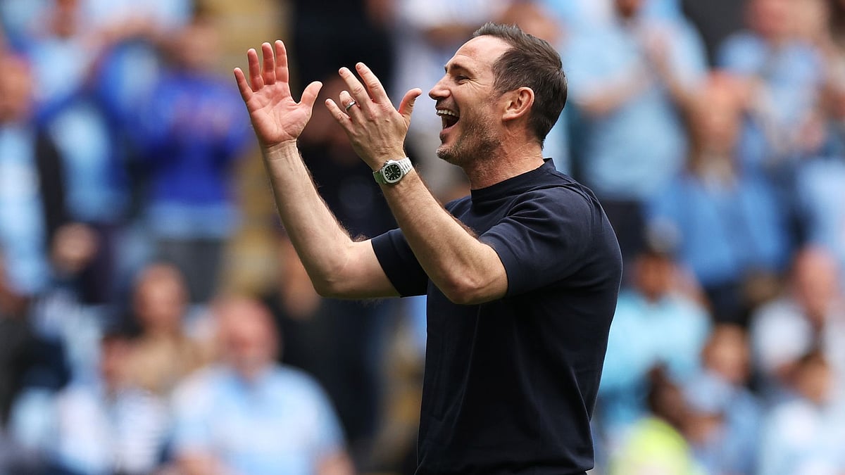 Lampard celebrates with Coventry's supporters