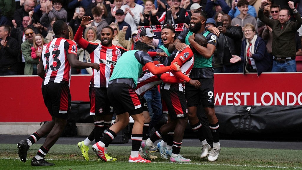 Photo: AP : Brentford's Yoane Wissa, second right, celebrates scoring his side's fourth goal during the English Premier League match against Manchester United.