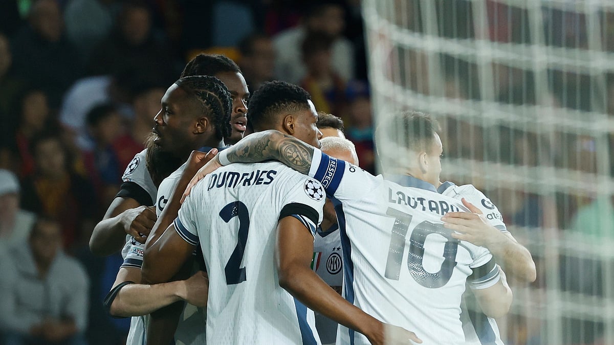 AP Photo/Joan Monfort : Inter Milan's Marcus Thuram, left, celebrates with his teammates after scoring his side's opening goal during the Champions League semifinal first leg football match in Barcelona.