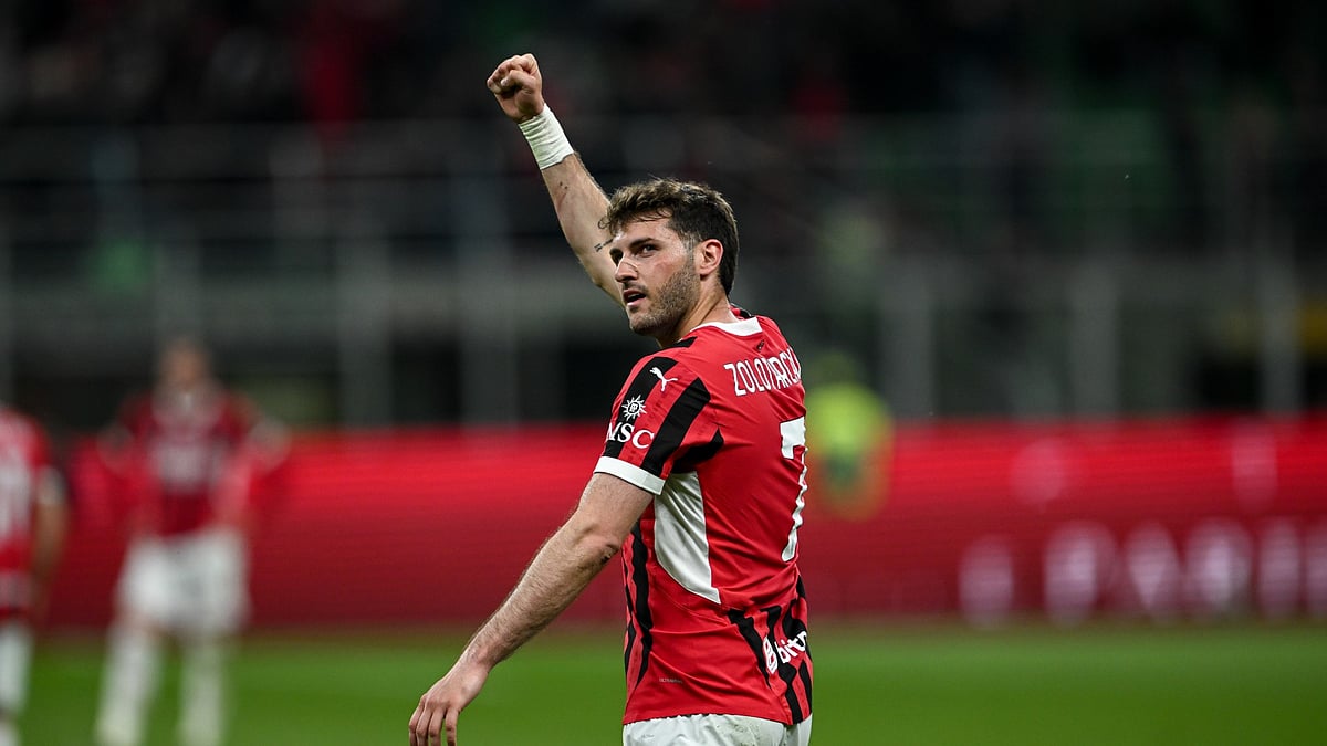 Santiago Gimenez celebrates scoring against Bologna.