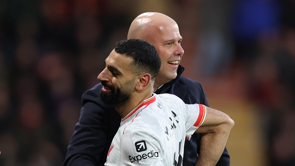 Liverpool forward Mohamed Salah with manager Arne Slot.