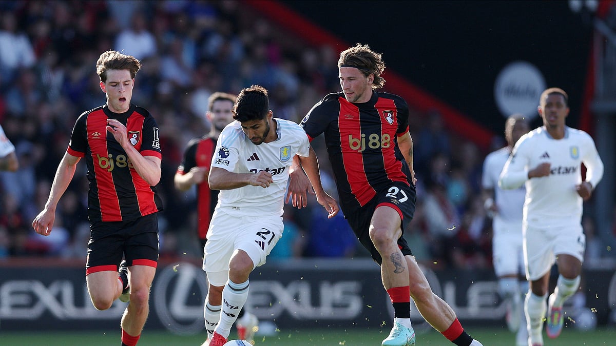 Steven Paston/PA via AP : Aston Villa's Marco Asensio, center left, and Bournemouth's Illya Zabarnyi battle for the ball during the English Premier League soccer match at the Vitality Stadium, Bournemouth, England.