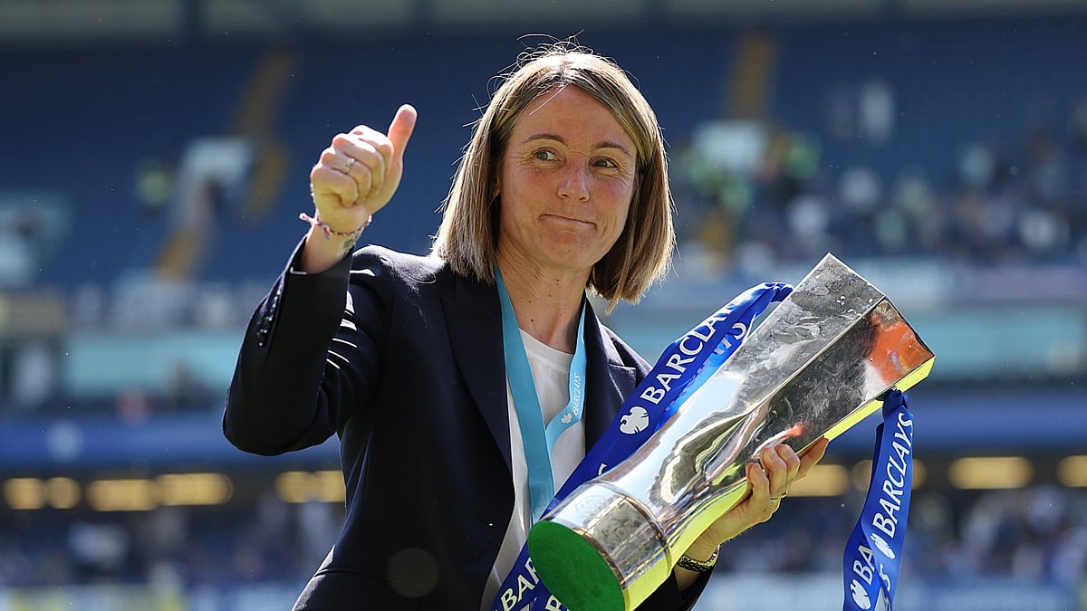 Sonia Bompastor with the WSL trophy.