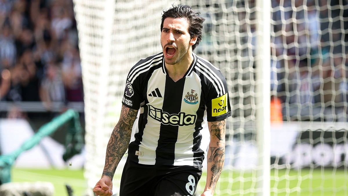 Sandro Tonali celebrates his goal against Chelsea