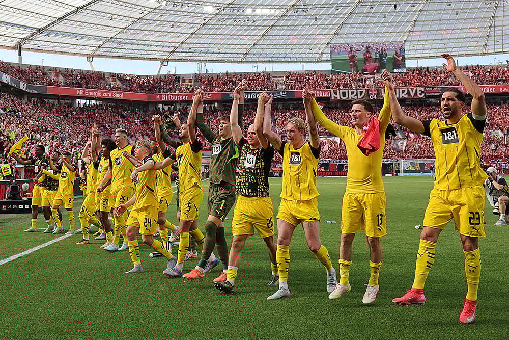 | Photo: Rolf Vennenbernd/dpa via AP : Bundesliga 2024-25: Bayer 04 Leverkusen vs Borussia Dortmund