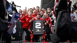 | Photo: X/ducaticorse : Ducati's Marc Marquez celebrates after coming second in Le Mans French Grand Prix 2025.