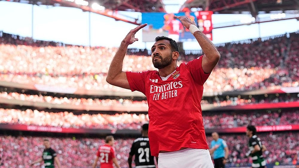 | Photo: AP/Armando Franca : Striker Vangelis Pavlidis, who is the joint top-scorer in Primeira Liga, celebrates after scoring against Sporting CP.