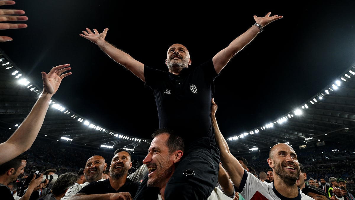 File : Vincenzo Italiano takes in the celebration at full-time on Wednesday.