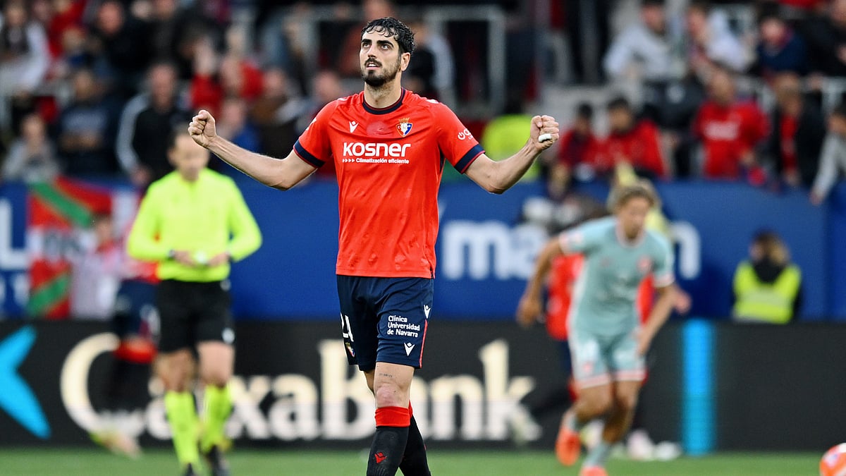 Osasuna's opening goalscorer Alejandro Catena celebrates