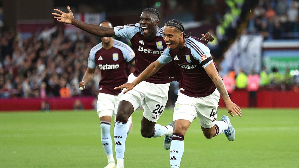 Photo: Nick Potts/PA via AP : Aston Villa's Boubacar Kamara, right, celebrates scoring his side's second goal with teammates during their English Premier League match against Tottenham Hotspur at Villa Park.